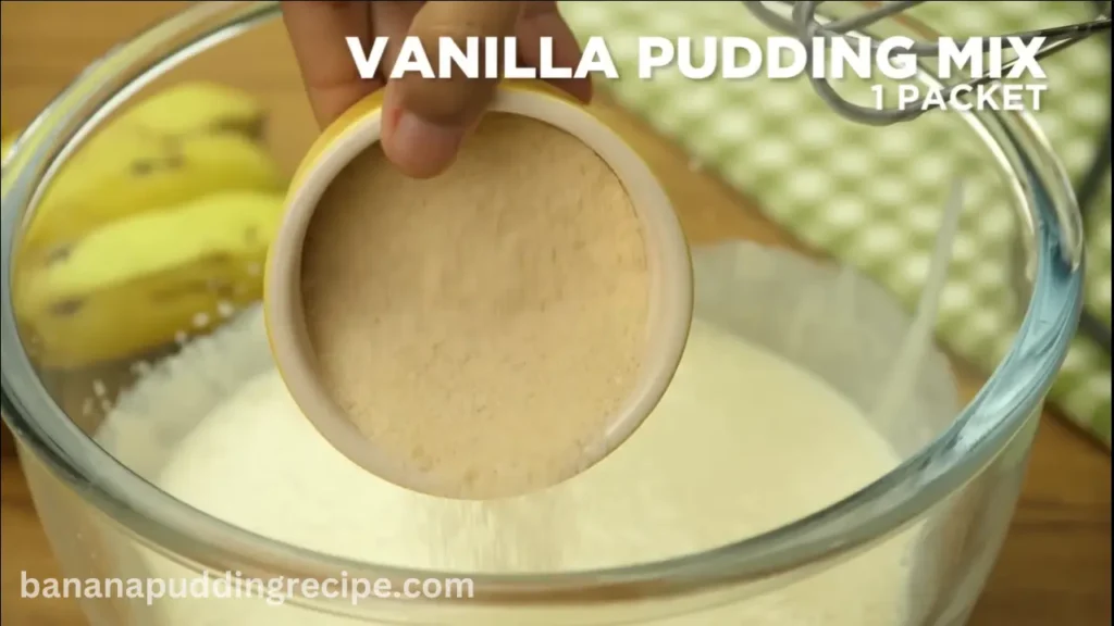 Add vanilla pudding mix and beat until well combined