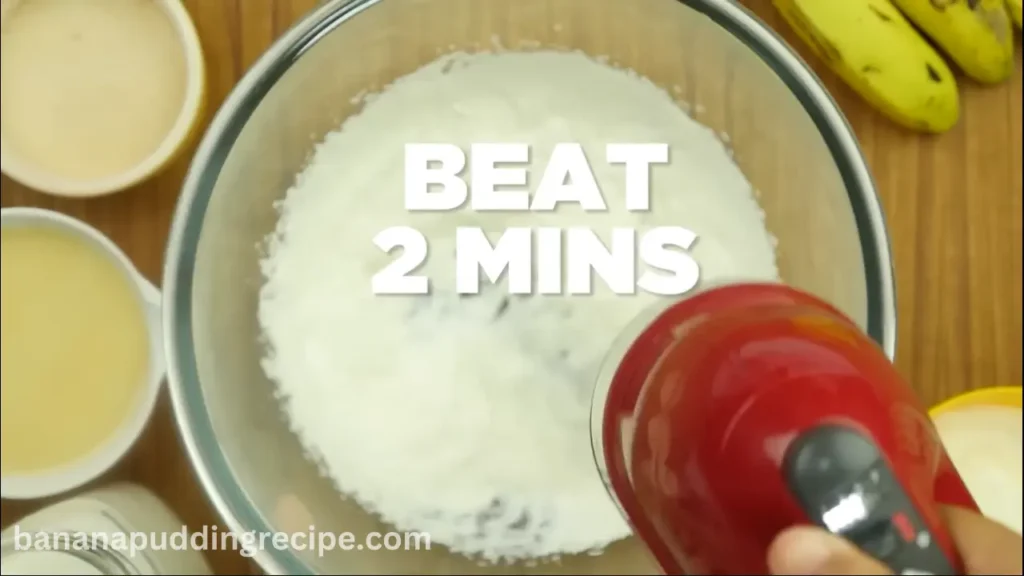 In a large bowl, add cream and beat for 2 minutes