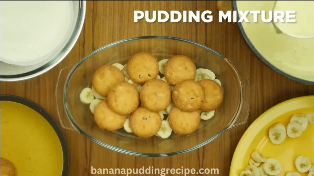 In a serving dish, arrange sliced bananas and biscuits evenly